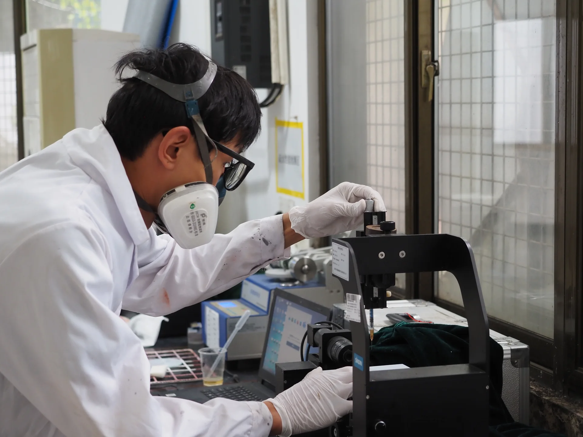 DSAN laboratory researcher operating test equipment